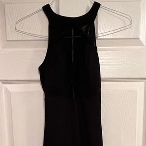 NWOT elegant long black dress with slit up the left leg, zip back (gown)